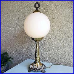 Vintage glass globe and solid brass table lamp