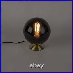 Art Deco table lamp brass with black glass