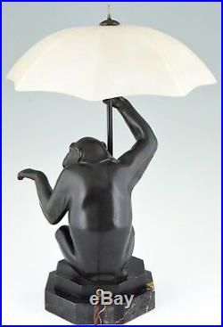 Art Deco table lamp seated monkey with umbrella Max Le Verrier France 1930
