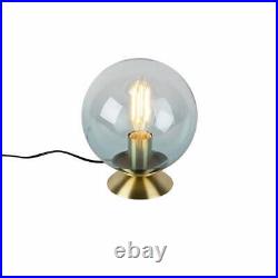 Art deco table lamp brass with blue glass